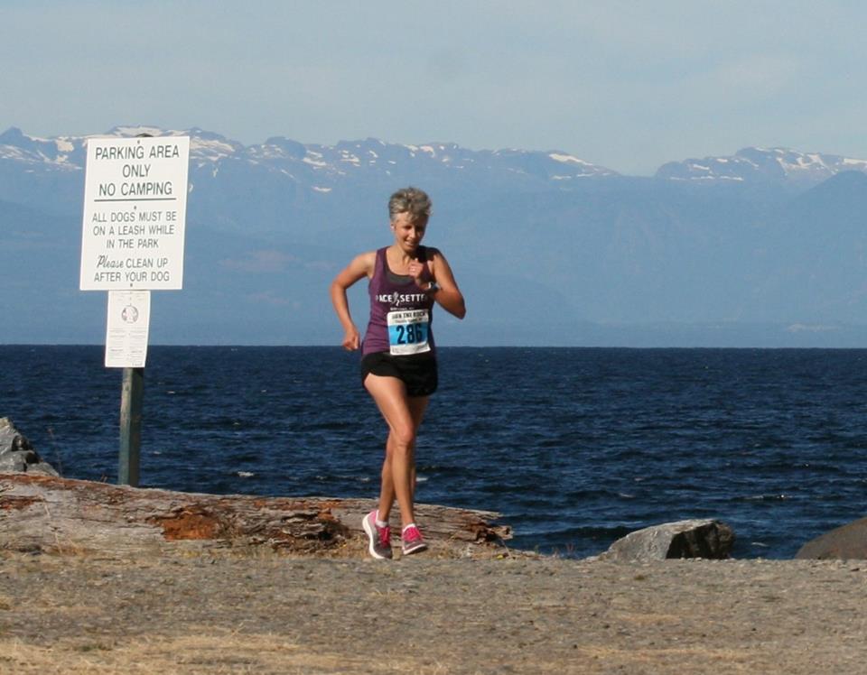Teresa finishing Run the Rock Half Marathon